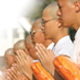 What is the historical background of the Buddhist Lent season or rainy retreat and the activities of monks during these months?