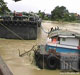 ภัยพิบัติ น้ำเสียจากเรือน้ำตาลล่มที่อยุธยาไหลมาถึงปทุมธานี