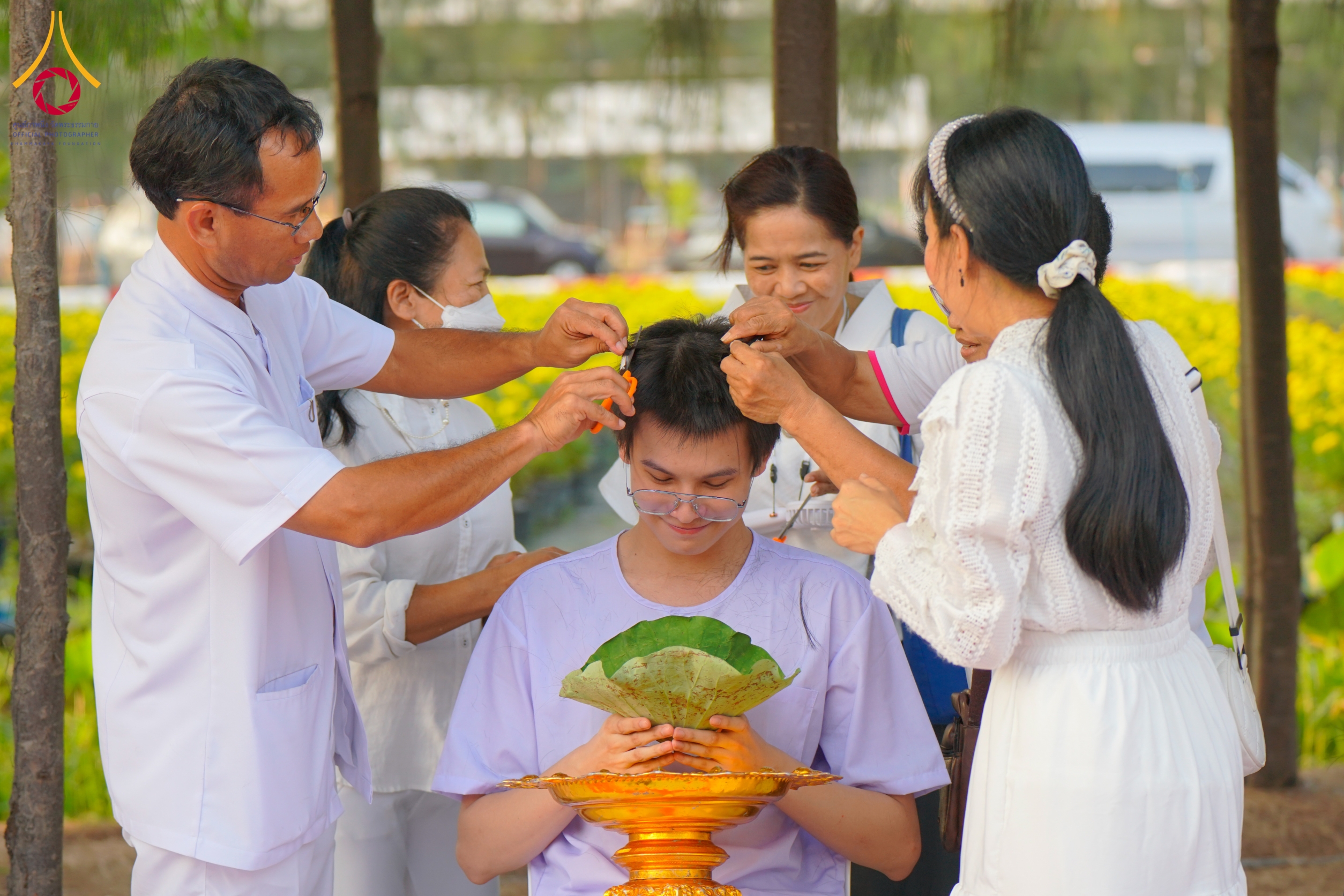 พิธีตัดปอยผมโครงการอุปสมบทหมู่ธรรมทายาทระดับอุดมศึกษา รุ่นที่ 51
