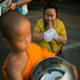 ตักบาตรพระภิกษุสามเณรภาคฤดูร้อน AEC 100,000 รูป ณ วัดพระธรรมกาย